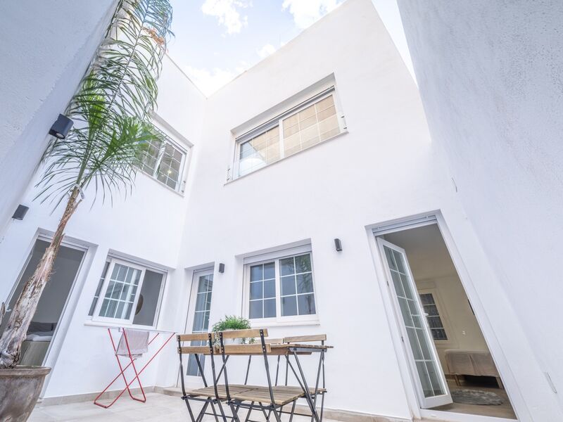 Lys ned i gårdhaven